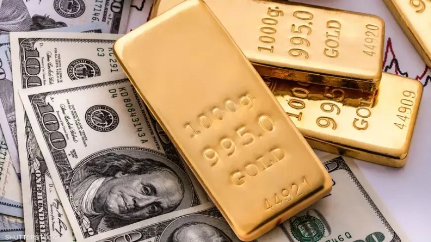 ” انخفاض سعر الذهب لأدنى مستوى في أسبوعين مع ارتفاع الدولار وتهدئة المخاوف التجارية “