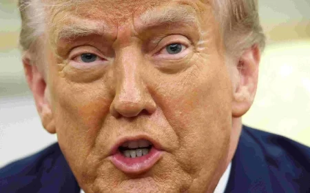 Trump warns violence may rise following ICE shooting