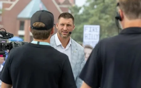 Tim Tebow Unveils Florida-Texas Pick with Dramatic Shirt Removal on SEC Nation