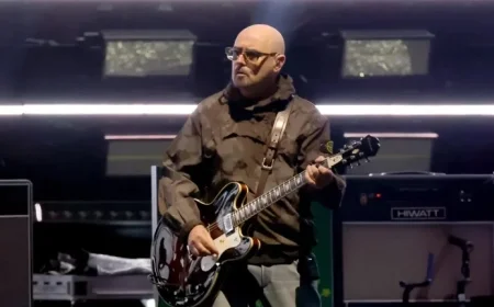 Oasis Guitarist Paul Arthurs Pauses Tour for Crucial Cancer Treatment