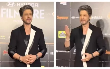 Shah Rukh Khan Steals the Spotlight at Filmfare Awards 2025 with Red Carpet Poses and Charming Kisses Watch the Bollywood Magic Unfold