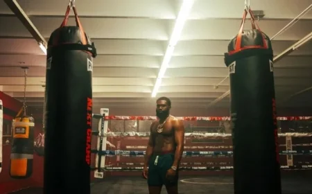 Ennis Triumphs Over Lima with TKO Victory Eyes Showdown with Ortiz Next