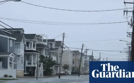 Nor’easter causes US east coast flooding while storm devastates homes in Alaska