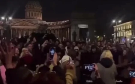 Massive turnout at rare anti-Putin protest in St Petersburg as teen faces arrest for singing