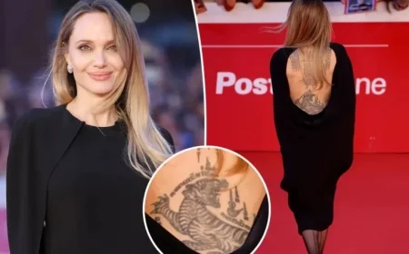 Angelina Jolie Dazzles in Backless Dress Showcasing Her Striking Back Tattoos at Rome Premiere of Couture