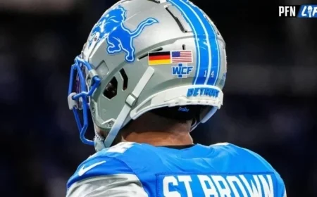 Unveiling the Mystery: Why Lions WR Amon-Ra St. Brown Wears a German Flag on His Helmet