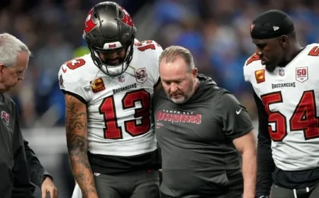 Bucs’ Evans Suffers Concussion and Shoulder Injury During Game Exit