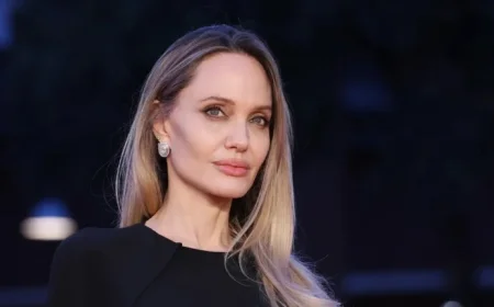 Angelina Jolie Stuns with Tattoo-Revealing Take on Fall’s Hottest Trend