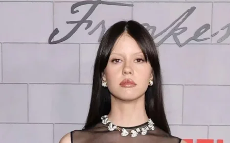 Mia Goth Exudes Macabre Glamour in Sheer Little Black Dress
