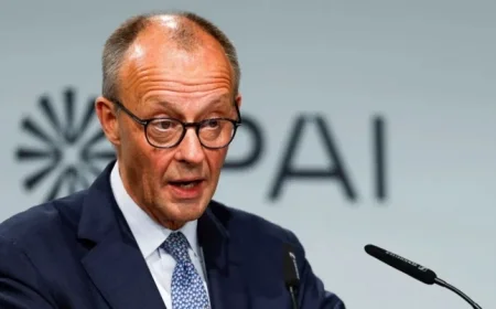 German Chancellor Confronts Intensifying Criticism on Migration Comments