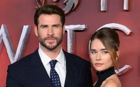 Gabriella Brooks Stuns in Backless Gown at Red Carpet with Liam Hemsworth