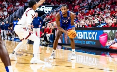 Peterson Leads KU to 90-82 Victory Over No. 11 Louisville Exhibition