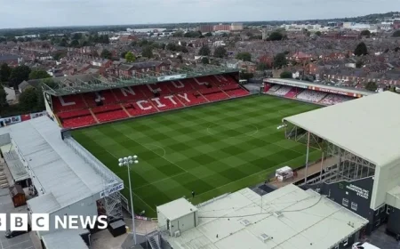 Lincoln City Penalized Following Fan Abuse Directed at Wrexham’s James McClean