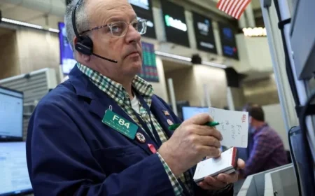 Wall Street Hits Record Highs Amid Cooling Inflation and Strong Earnings