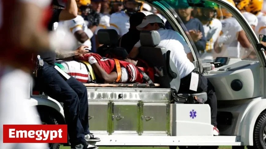 Oklahoma WR Lewis Suffers Injury in Headfirst Collision with Brick Barrier