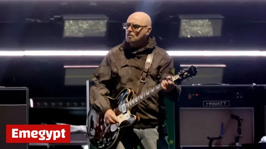 Oasis Guitarist Paul Arthurs Pauses Tour for Crucial Cancer Treatment