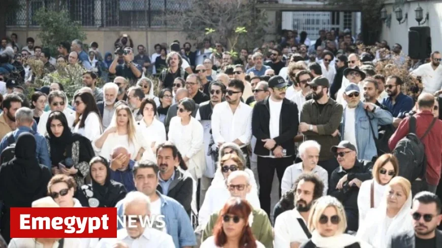 Nasir Taghvai’s Coffin Carried by Mourners in White Attire