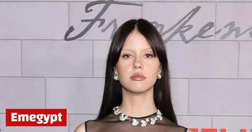 Mia Goth Exudes Macabre Glamour in Sheer Little Black Dress