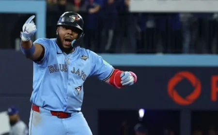 Vladimir Guerrero Jr. Sports “Captain Clutch” Poulin Jersey at World Series Game 7