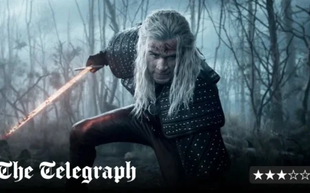 Liam Hemsworth Wears Henry Cavill’s Wig for a Hilariously Silly Comeback in The Witcher