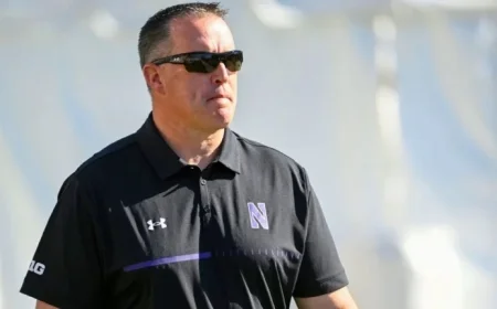 Former NU Coach Fitzgerald Vindicated by Settlement Agreement