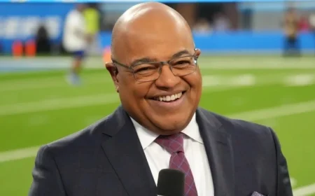 Mike Tirico Delights Fans with Clever Cameron Dicker Comment on SNF