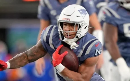 New England Patriots Triumph Over New York Jets to Secure NFL’s Top Spot with TreVeyon Henderson Hat-Trick