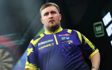 Luke Littler Triumphs Over Josh Rock to Reach Grand Slam of Darts Semi-Finals Against Danny Noppert