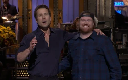 Glen Powell Surprises SNL Audience with UPS Driver Who Almost Thought It Was a Scam