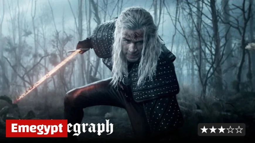 Liam Hemsworth Wears Henry Cavill’s Wig for a Hilariously Silly Comeback in The Witcher