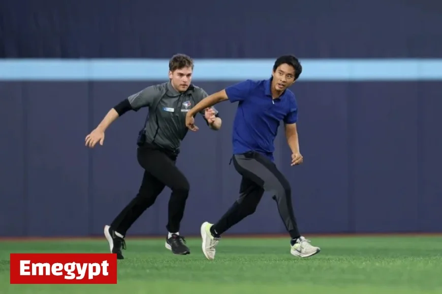Spectator Disrupts Game 6 by Jumping onto Rogers Centre Field