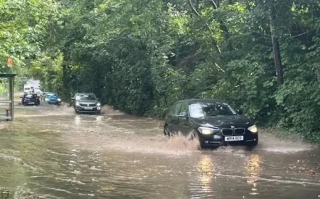 Met Office Issues Weather Warning: Torrential Rain Triggers Flood Alerts and Road Closures