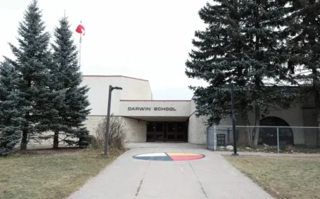 Nervous Parents Encounter Locked Doors and Guards Amid School Assault Scene