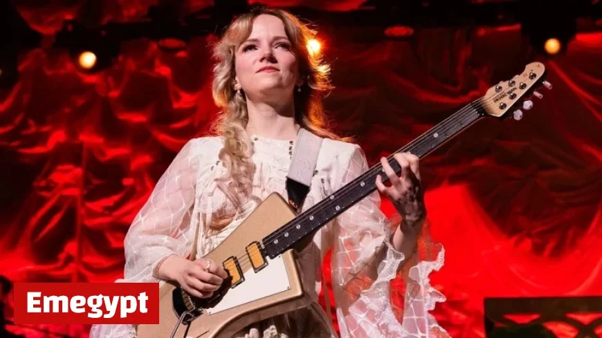 Guitarist Emily Roberts, favored by Brian May and Johnny Marr, opens up about choosing a unique sound and battling imposter syndrome